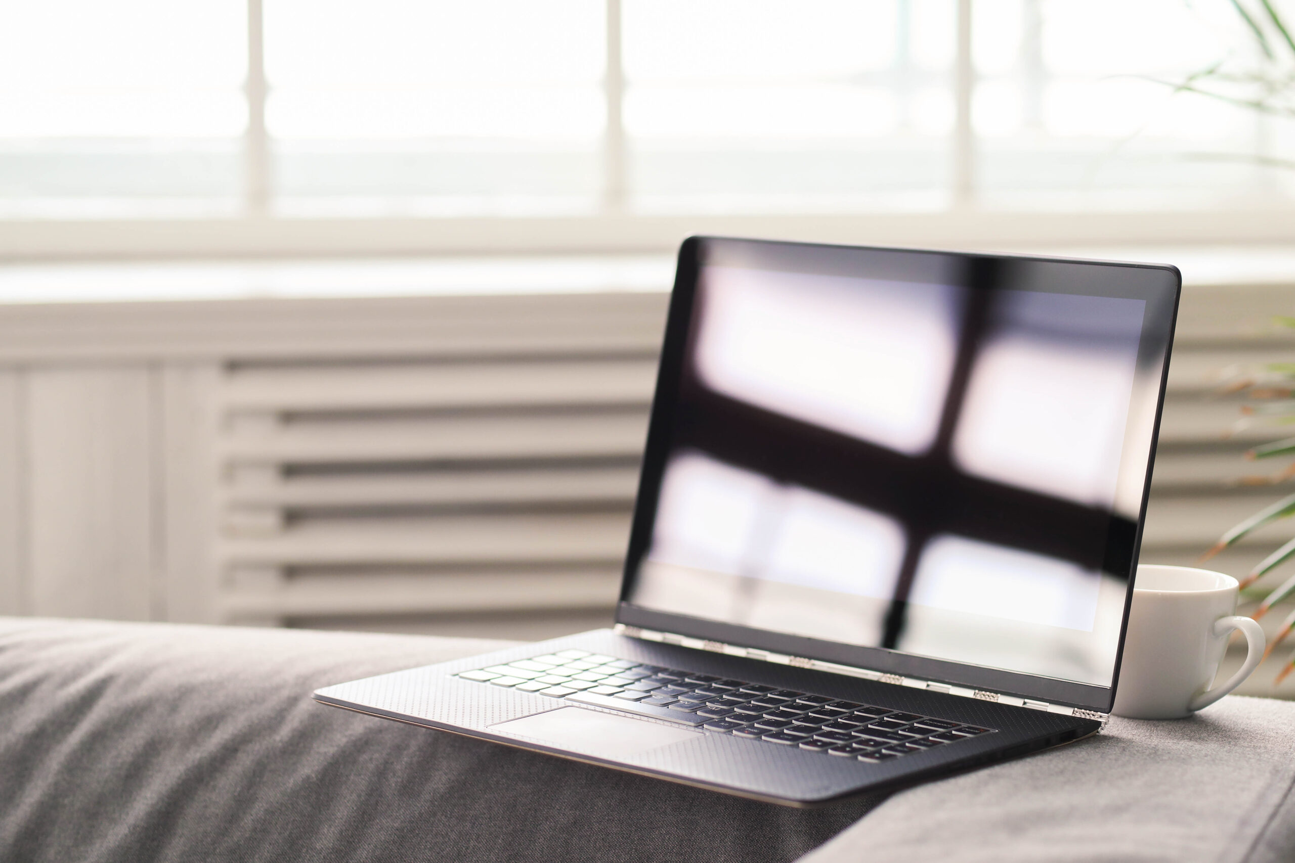 Technology and internet. Laptop at home